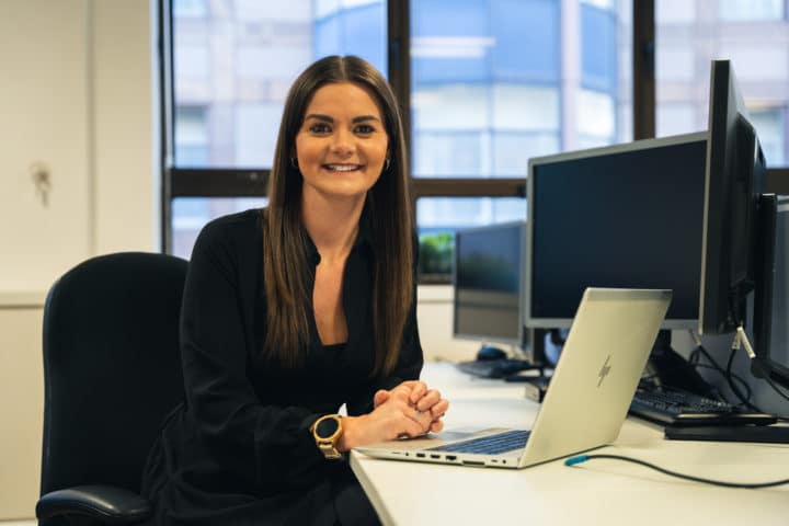 Leanne Page Equinti 2 employee woman standing smiling