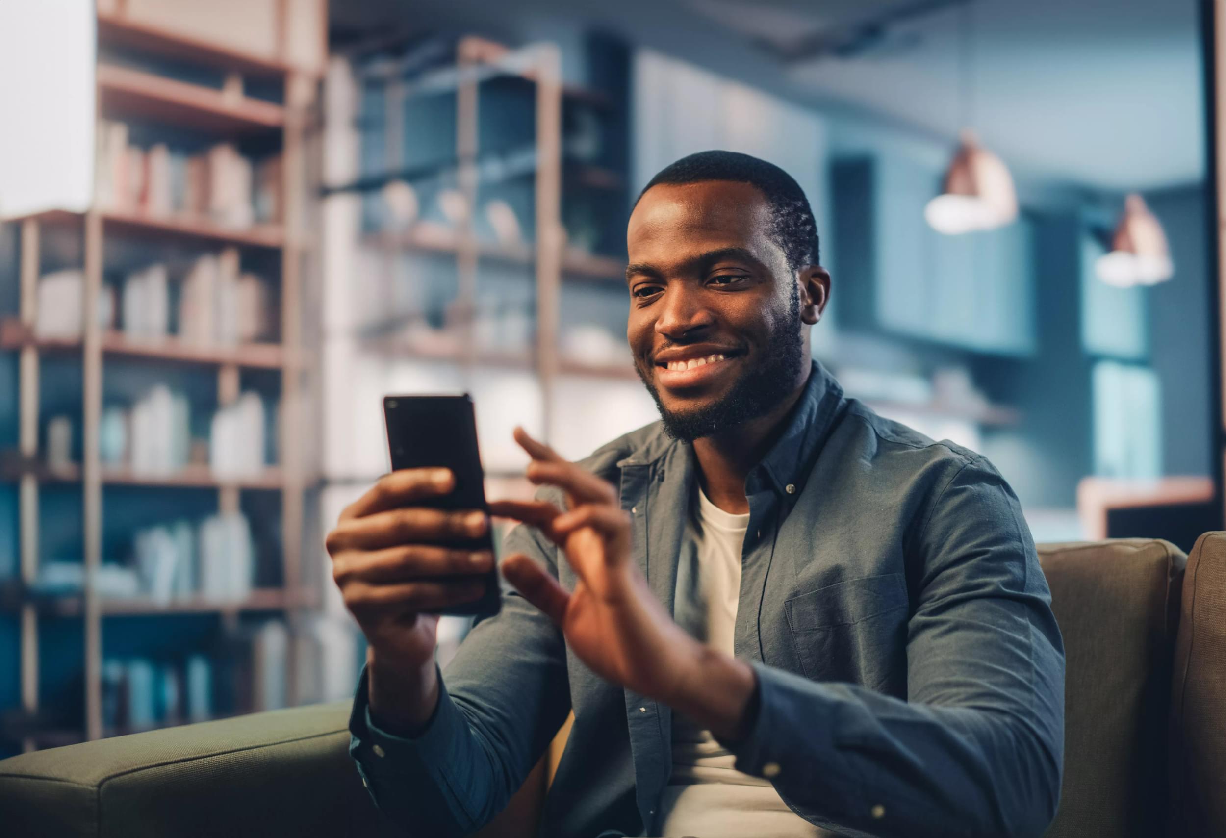 Man tapping phone - Large