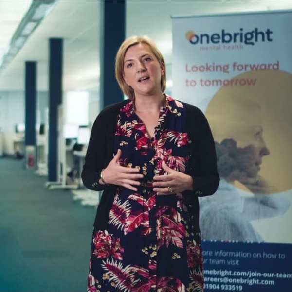OneBright employee talking